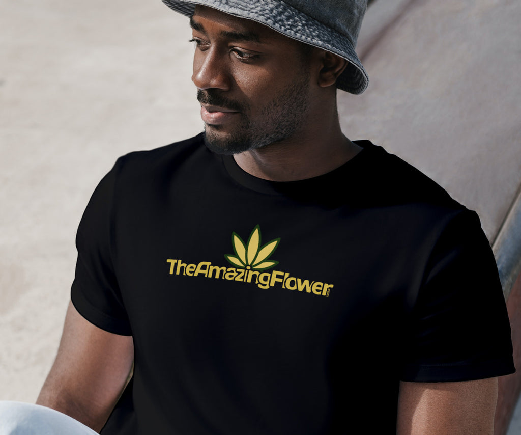 Old Gold Hemp Leaf Logo T-Shirt in black worn by a man with a hat looking to his right