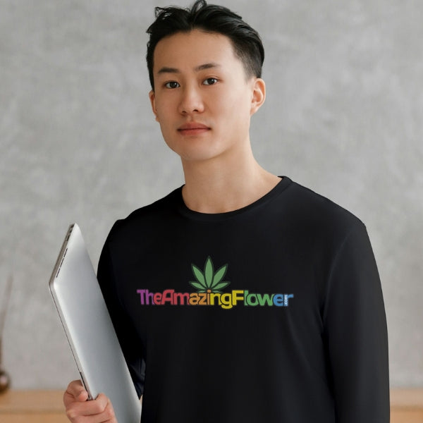 Hemp Leaf Rainbow Logo Long Sleeve T-Shirt worn by a young Asian man holding a laptop computer while looking at the camera